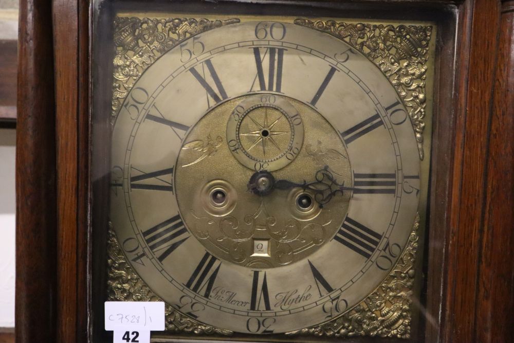 A George III oak eight day longcase clock, brass and silvered dial marked Mercer Hythe, height 218cm